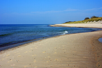 Sandy coast of the blue sea