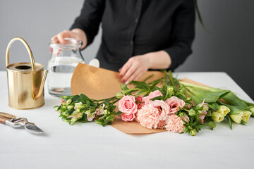 Obraz na płótnie Canvas Bouquet 015. step by step installation of flowers in a vase. Flowers bunch, set for home. Fresh cut flowers for decoration home. European floral shop. Delivery fresh cut flower.
