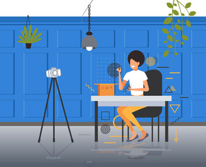 woman technology blogger opening box with headphones recording unboxing video with camera on tripod blogging live streaming concept modern office interior horizontal full length