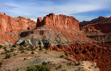 spectacular view of eroded cliffs and colorful soils along the chimney rock trail on a sunny autumn...