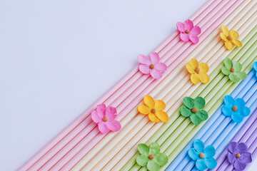 Pastel colored paper flower petal on the pastel stick, Spring Summer image wallpaper, card