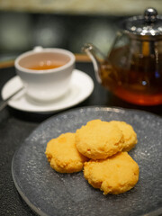 Cafe - cookies with teapot and a cup of tea