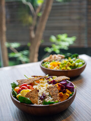 Cafe - Salad bowl with variety of vegetable, beans, salad cream
