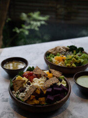 Cafe - Salad bowl with variety of vegetable, beans, salad cream