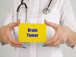 Medical concept about Brain Tumor with phrase on the piece of paper.