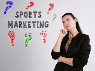 Business concept meaning SPORTS MARKETING question marks with inscription on the side