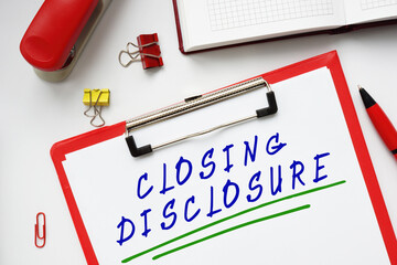 Business concept meaning CLOSING DISCLOSURE with sign on the sheet.