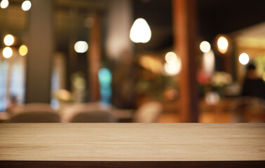 Empty wooden table in front of abstract blurred background of coffee shop . can be used for display or montage your products.Mock up for display of product