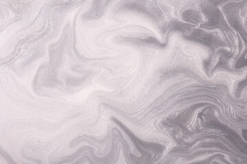 Abstract fluid art background silver and white color. Liquid marble. Acrylic painting on canvas with gray shiny gradient