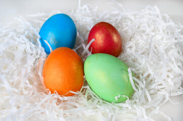 Painted chicken eggs on a white background. Easter concept Handmade, creativity with children for decoration on easter