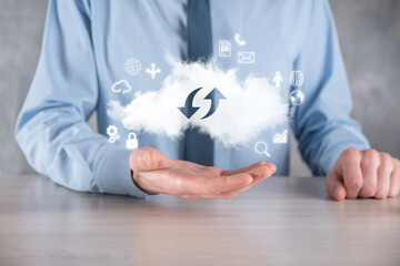 Cloud technology. cloud storage sign with two arrows up and down on dark . Cloud computing, big data center, future infrastructure, digital ai concept. Virtual hosting symbol