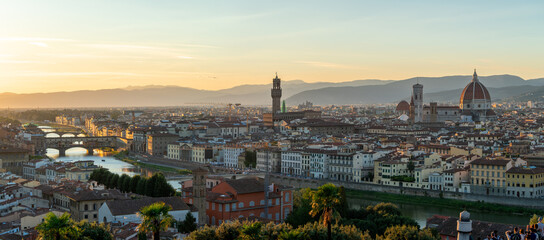 Florence or Firenze sunset aerial cityscape. Panorama view from Michelangelo park square. Ponte Vecchio bridge, Palazzo Vecchio and Duomo Cathedral. Tuscany, Italy