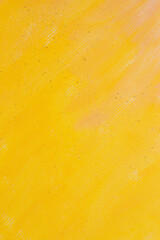Obraz premium abstract colored creative background: stains of yellow paint-primer on rough linen canvas, temporary object, not an object of art.