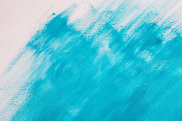 creative background, a spot of heavenly colored primer rubbed on the surface of a linen canvas, temporary object, close, toning