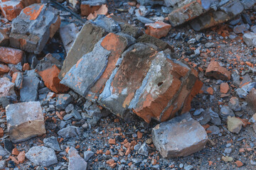 a brick falls from the roof onto the carriageway