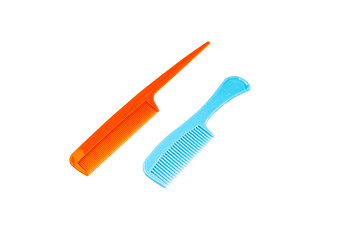 Close up of plastic  comb on white background , equipment; fashion,