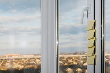 Paper stickers are pasted on the plastic window