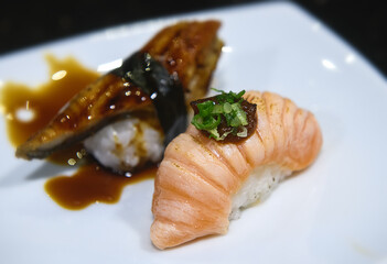 Japanese salmon belly slice and  burn sushi.