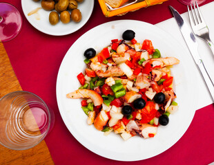 Seafood salad Salpicon de marisco on a white plate