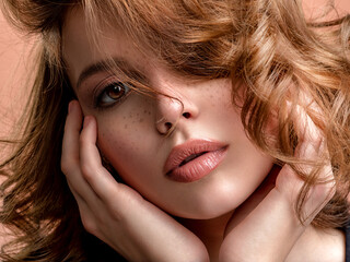 Beautiful face of an white woman. Beautiful brown haired with stylish short hairstyle. Woman with a...