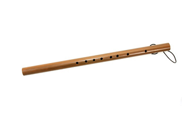 Wooden flute on white background