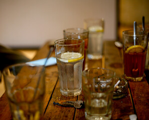 glass of lemon tea and cocktail