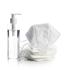 Coronavirus prevention hand sanitizer and kn95 respirator mask. Hand disinfectant gel in pump bottle.
