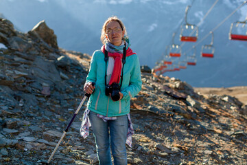 Middle-aged attractive woman mountain portrait. Healthy lifestyle. Beautiful female person....