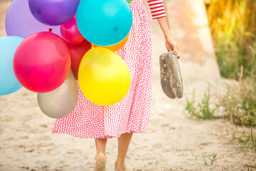 Young woman with balloons  early in the morning © PEPPERSMINT