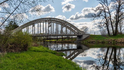 Fototapeta na wymiar Most Sokolovskych hrdinu brudge with Olse river in Karvina city in Czech republic