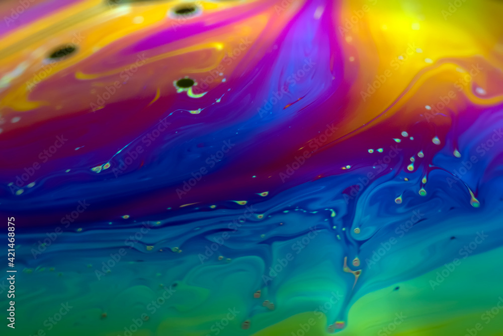 Wall mural colorful psychedelic soap bubble refractions pattern macro. colorful macro soap bubble iridescence