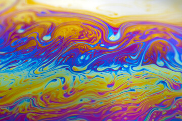 Fototapeta na wymiar Colorful psychedelic soap bubble refractions pattern macro. Colorful macro Soap bubble iridescence