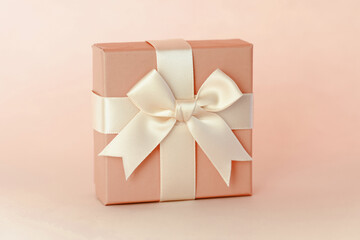 Closeup in blue gift box with beautiful ribbon