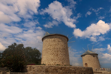 (&Ccedil;eşme - Izmir -Turkey 08 May 2004) A beautiful cloudy sky and windmills in Ala&ccedil;atı in May,
