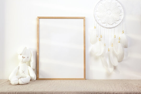 Nursery frame mockup with white bunny and dreamcatcher