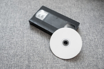 An old tape cassette with a white disc on it