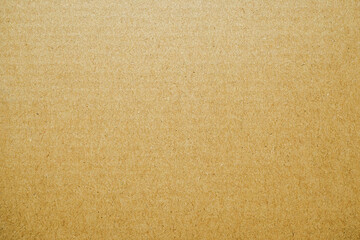 Fototapeta na wymiar Paper box or packing paper texture, Brown horizontal line corrugated cardboard used for background, Close up