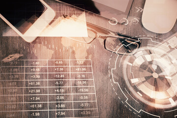 Multi exposure of forex graph hologram over desktop with phone. Top view. Mobile trade platform concept.