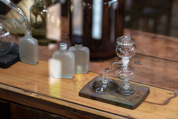 Siphon coffee maker made of glass, beautiful shape design in a coffee shop