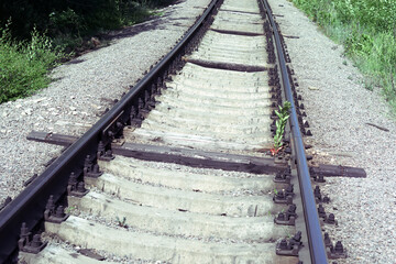 Obraz premium well maintained railway track. Steel rails on concrete sleepers. sleepers are installed to distribute the load