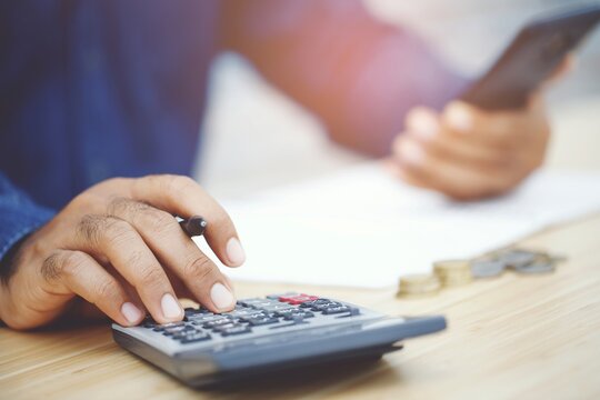 Accountants Are Calculating Financial Statements For Annual Taxes.