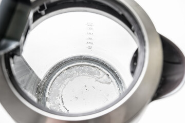 Kettle with white limescale surface - hard water concept