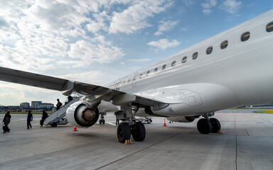 Plane disembarking silhouettes  at at airport 