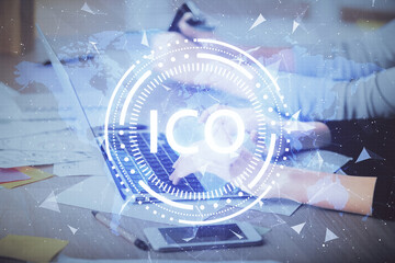 Double exposure of woman hands typing on computer and crypto market theme hologram drawing. Blockchain concept.