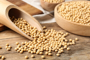 Natural organic soy beans on wooden table