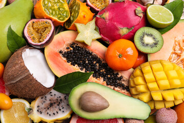 Different exotic fruits as background, top view