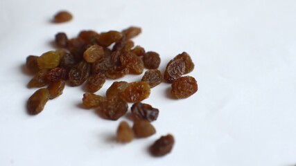 Yellow raisins pours down