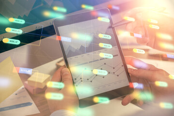Multi exposure of man's hands holding and using a digital device and data theme drawing. Innovation concept.