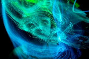 Multicolor abstract portrait of young woman on subject of creativity, imagination and art.