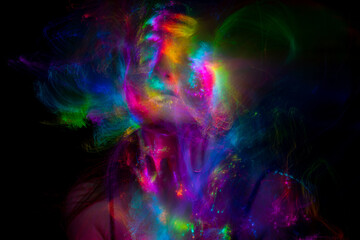 Multicolor abstract portrait of young woman on subject of creativity, imagination and art.